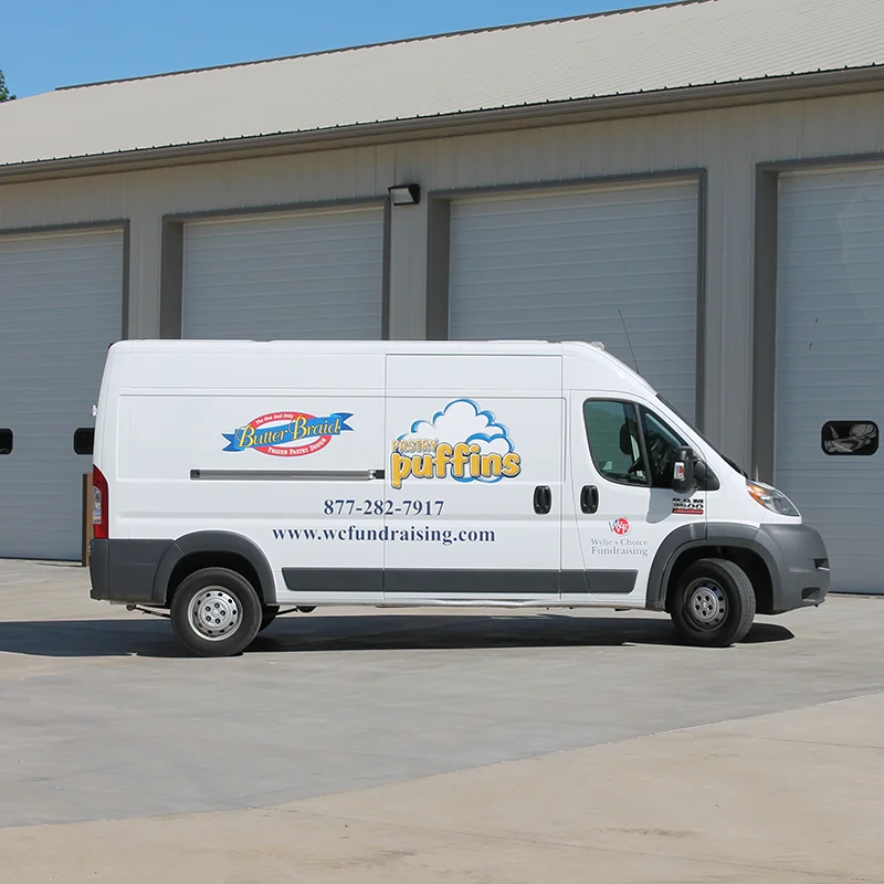 Wyhe's Choice Fundraising delivery van with Butter Braid and Pastry Puffins logos